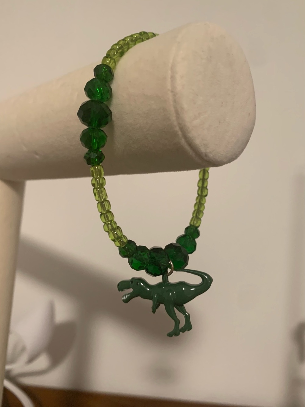 Green Beaded Bracelet with Dinosaur Charm